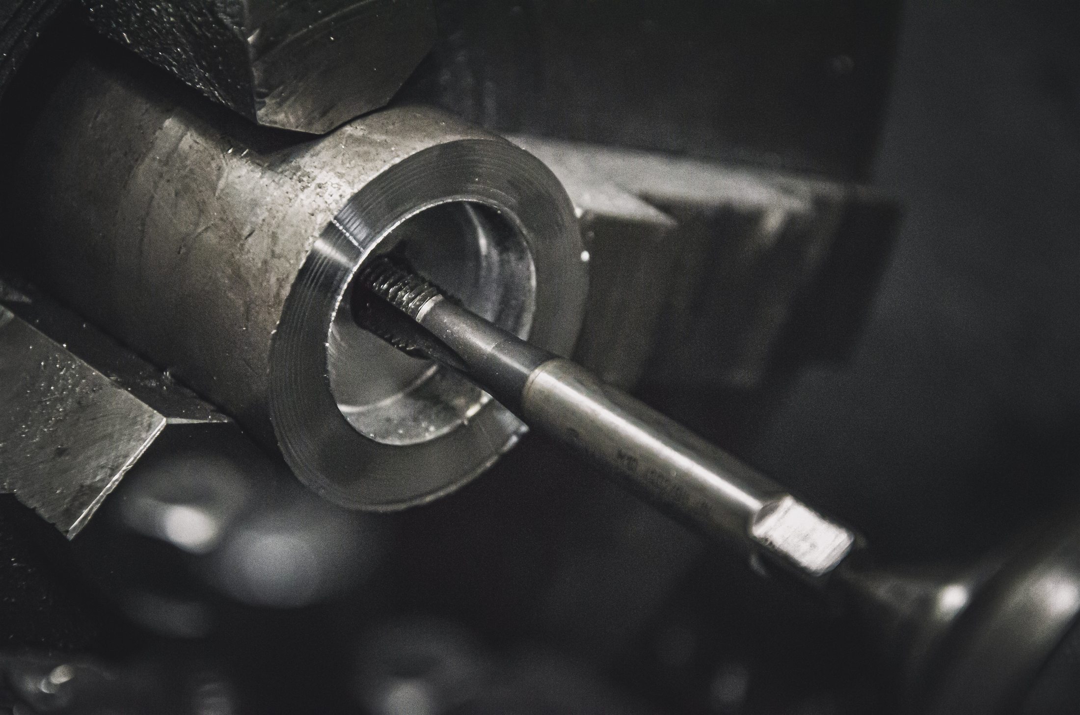 Close-up of precision tooling working inside a machined bore