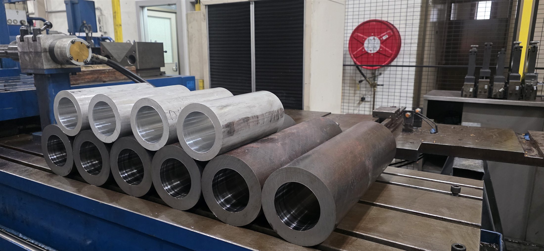 Rows of finished cylindrical components with clean internal bores