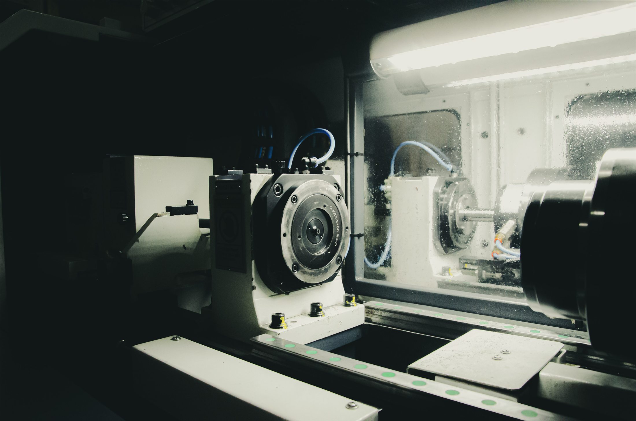 Close view of the micro drilling machine and precision workholding equipment