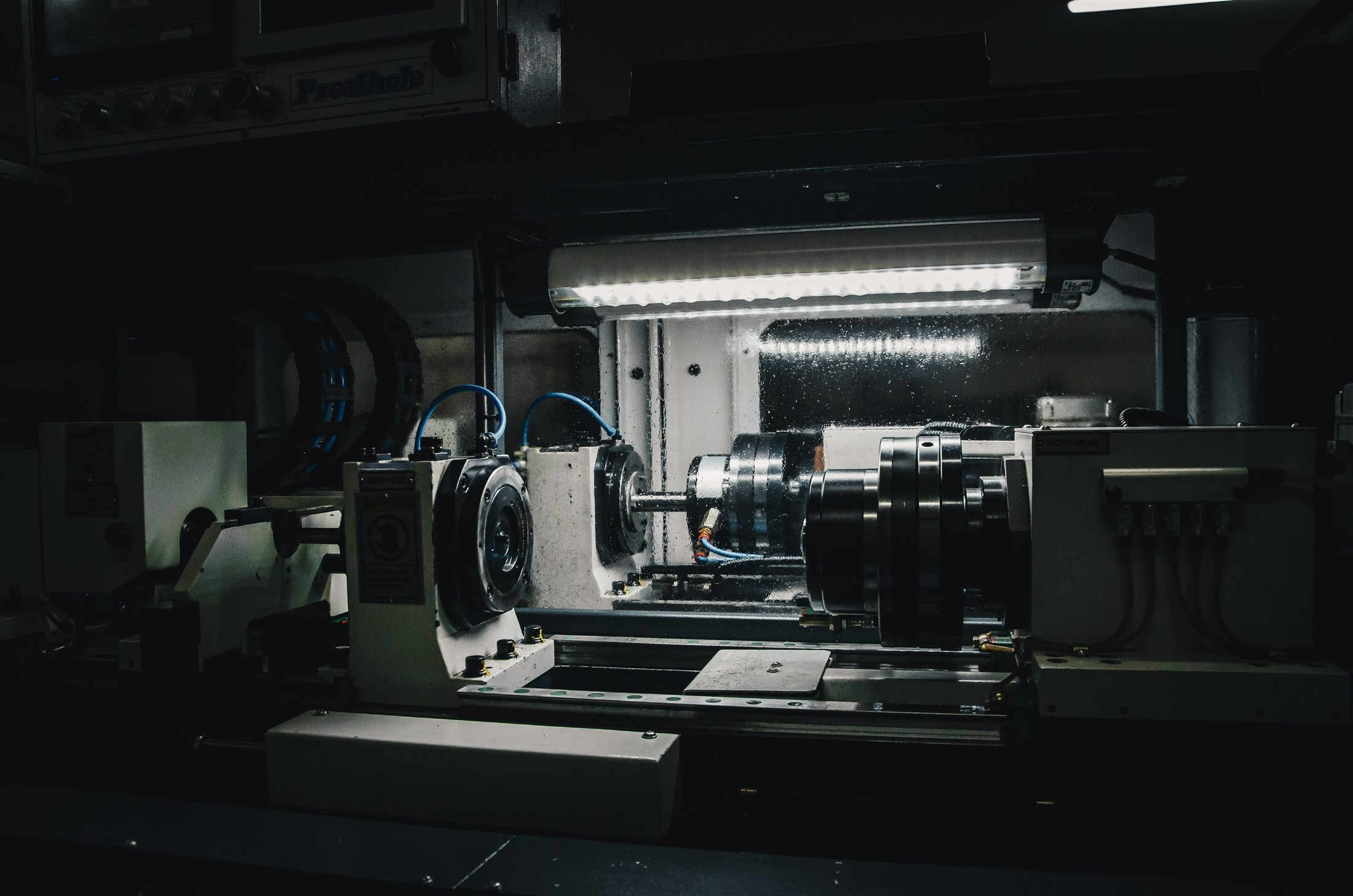 DHDS micro drilling machine operating inside the workshop